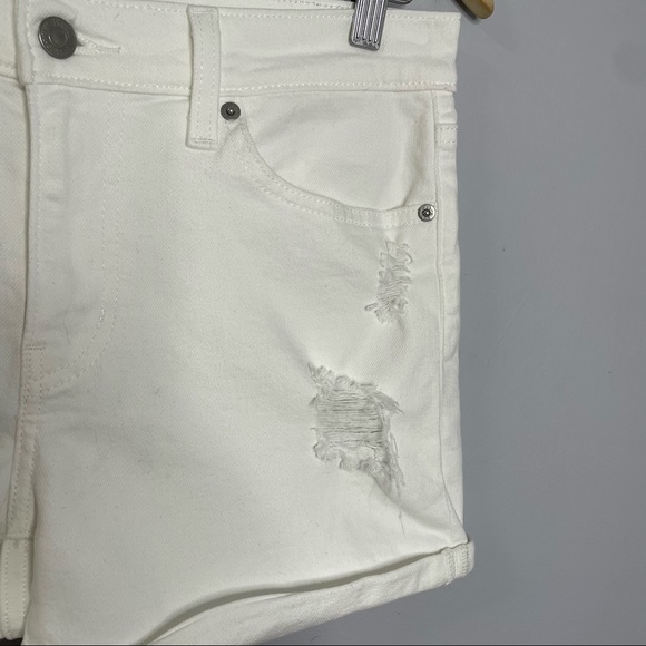 Levi’s Distressed Mid-Length White Shorts - Picture 4 of 9